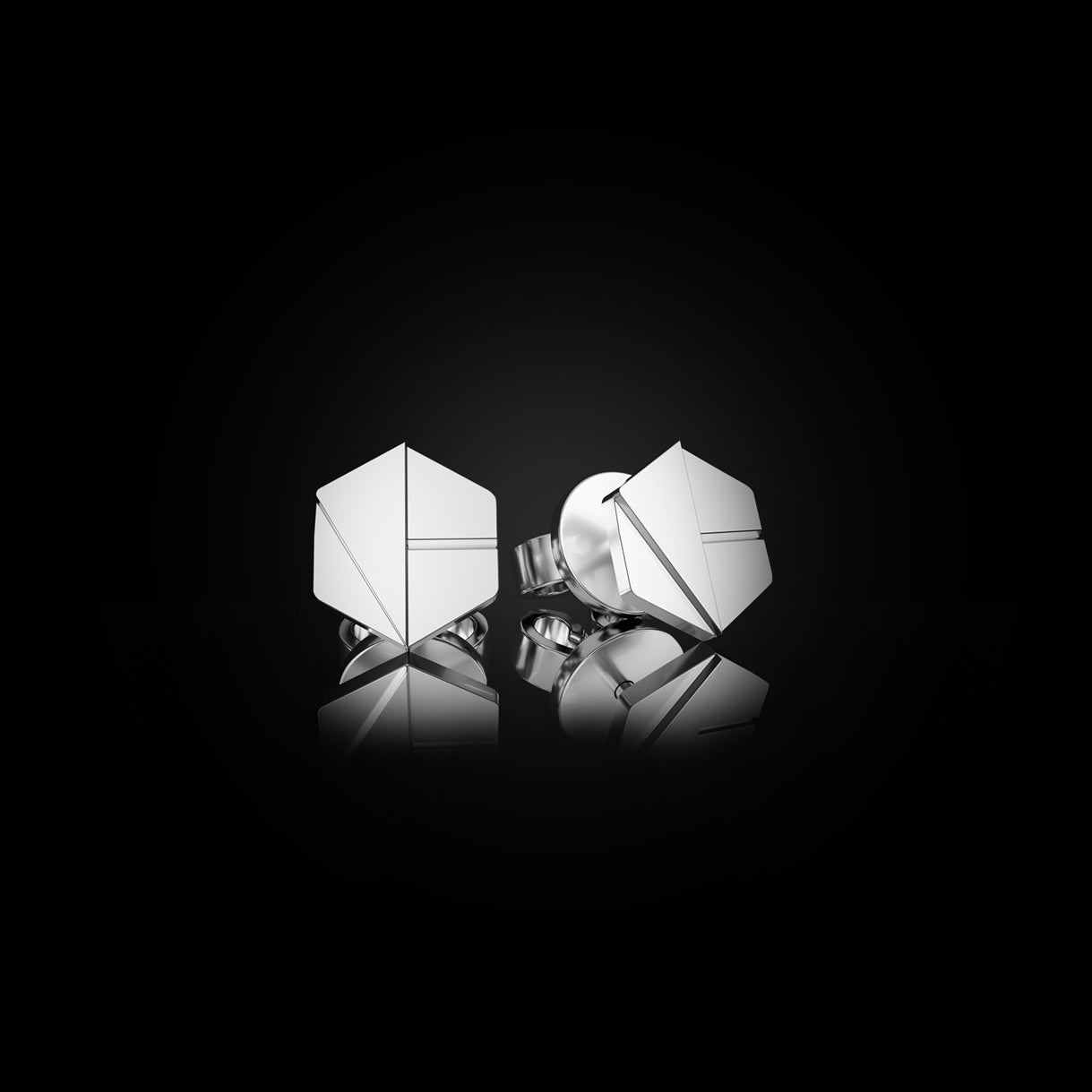 Hear You Mini Studs in Surge White Gold – 750 gold earrings for seers of the unseen, individually handcrafted by Naude Bourn. Sustainable gold jewelry, ethical jewelry, handcrafted artisan jewelry, fine jewelry, high-end jewelry, and ethical luxury. A visionary design from sustainable jewelry brands and a unique jewelry gift in white gold.